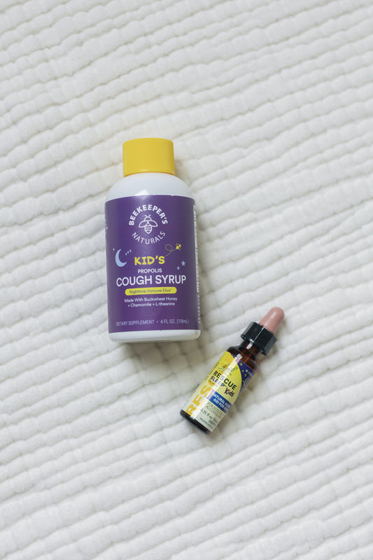Picture of the Kids Propolis Cough Syrup on a bed sheet