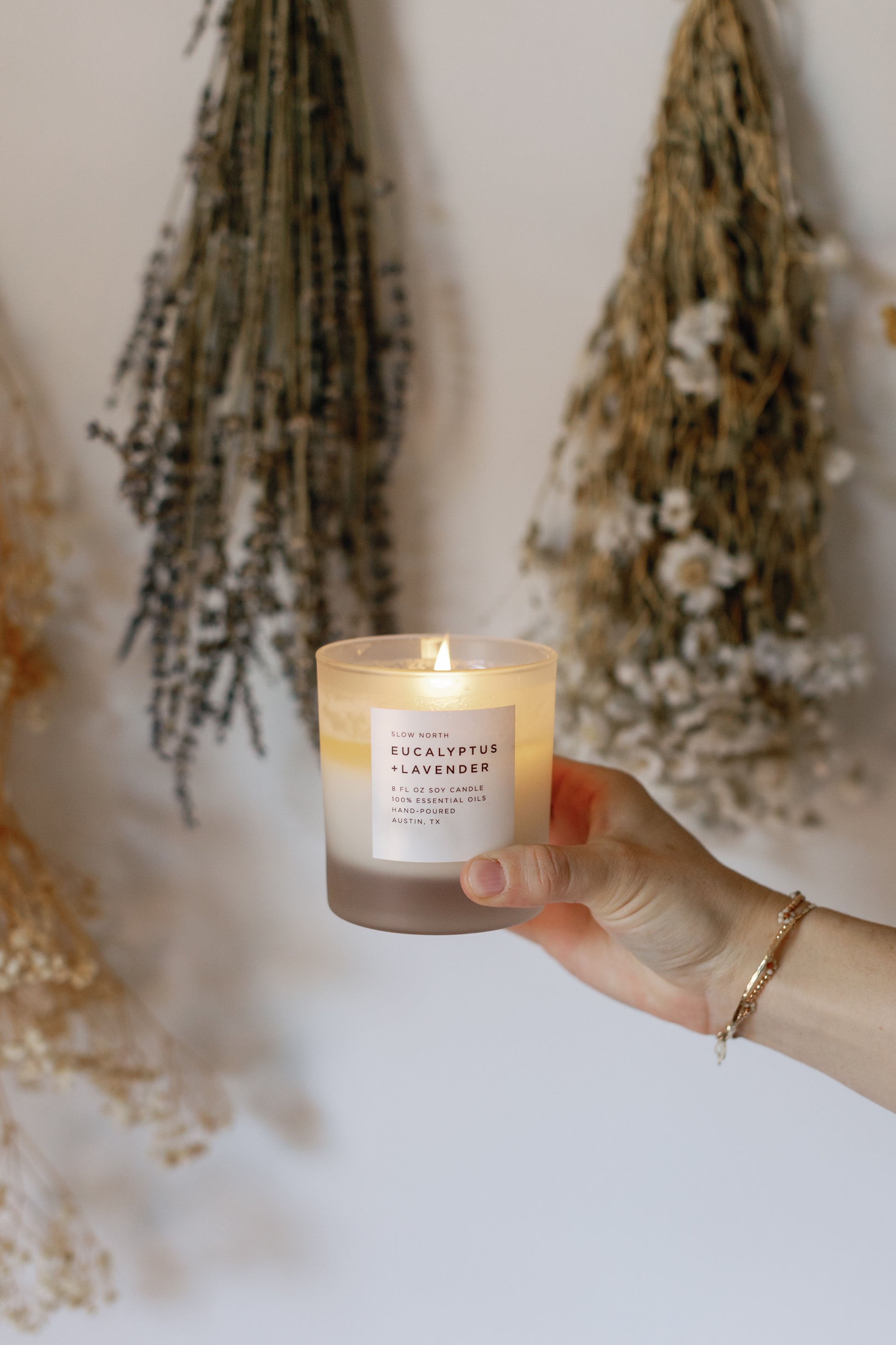 Picture of the lit Eucalyptus + Lavender Candle
