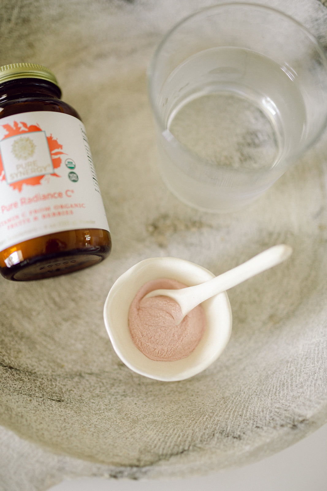 Pure Radiance Vitamin C Powder in a little dish