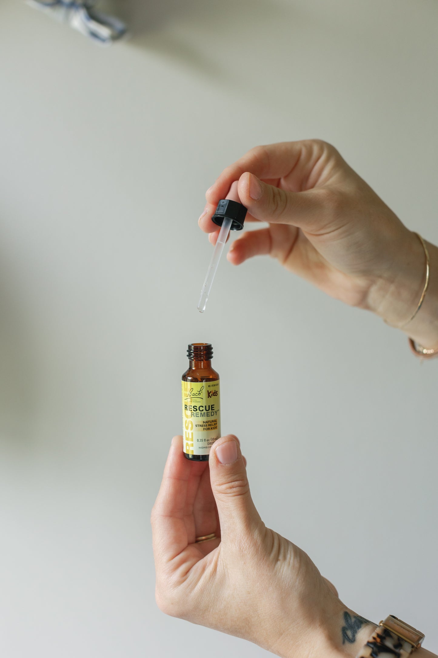 Picture of a dropper and the small container of the Bach Flower Rescue Remedy for Kids