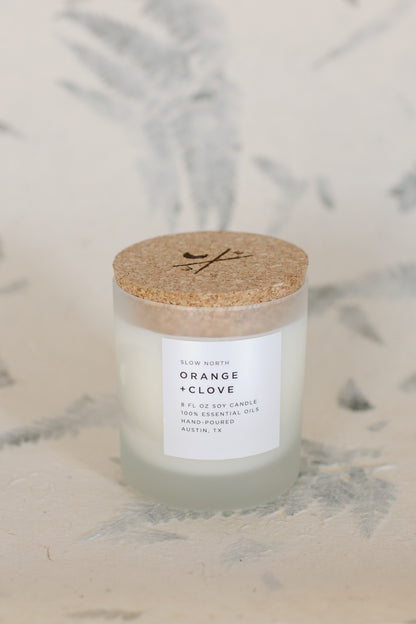 Front picture of the Orange Clove Candle with it's lid closed