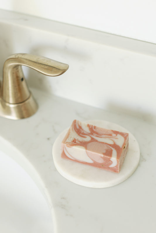 Picture of the Amalfi All Natural Soap bar on a bathroom sink