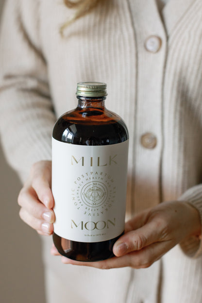 picture of the postpartum restorative tonic with a bottle that has the phrase "Milk Moon" written on it