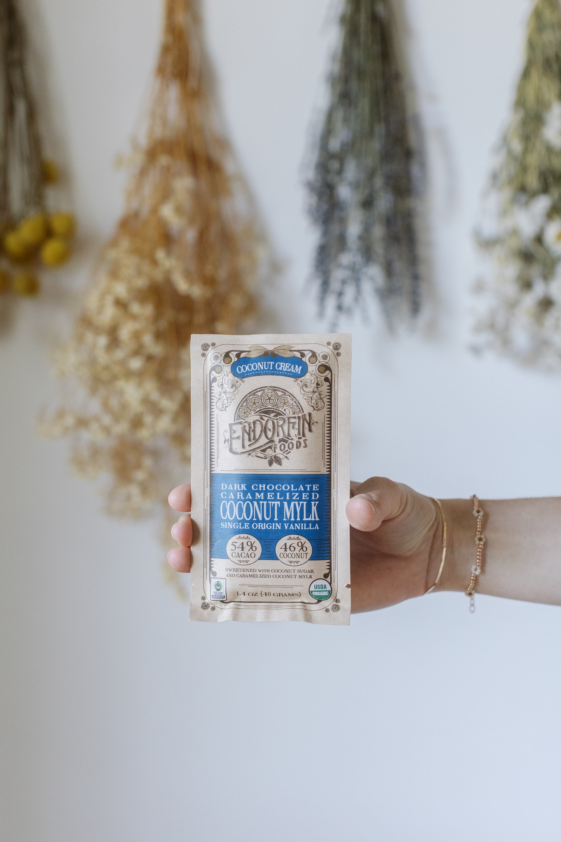 Picture of a hand holding the Coconut Cream Chocolate