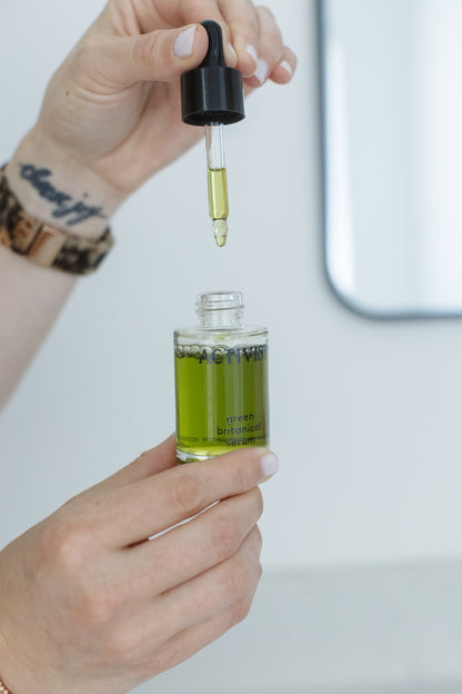 Using the dropper on the Mānuka Green Botanical Serum by Activist