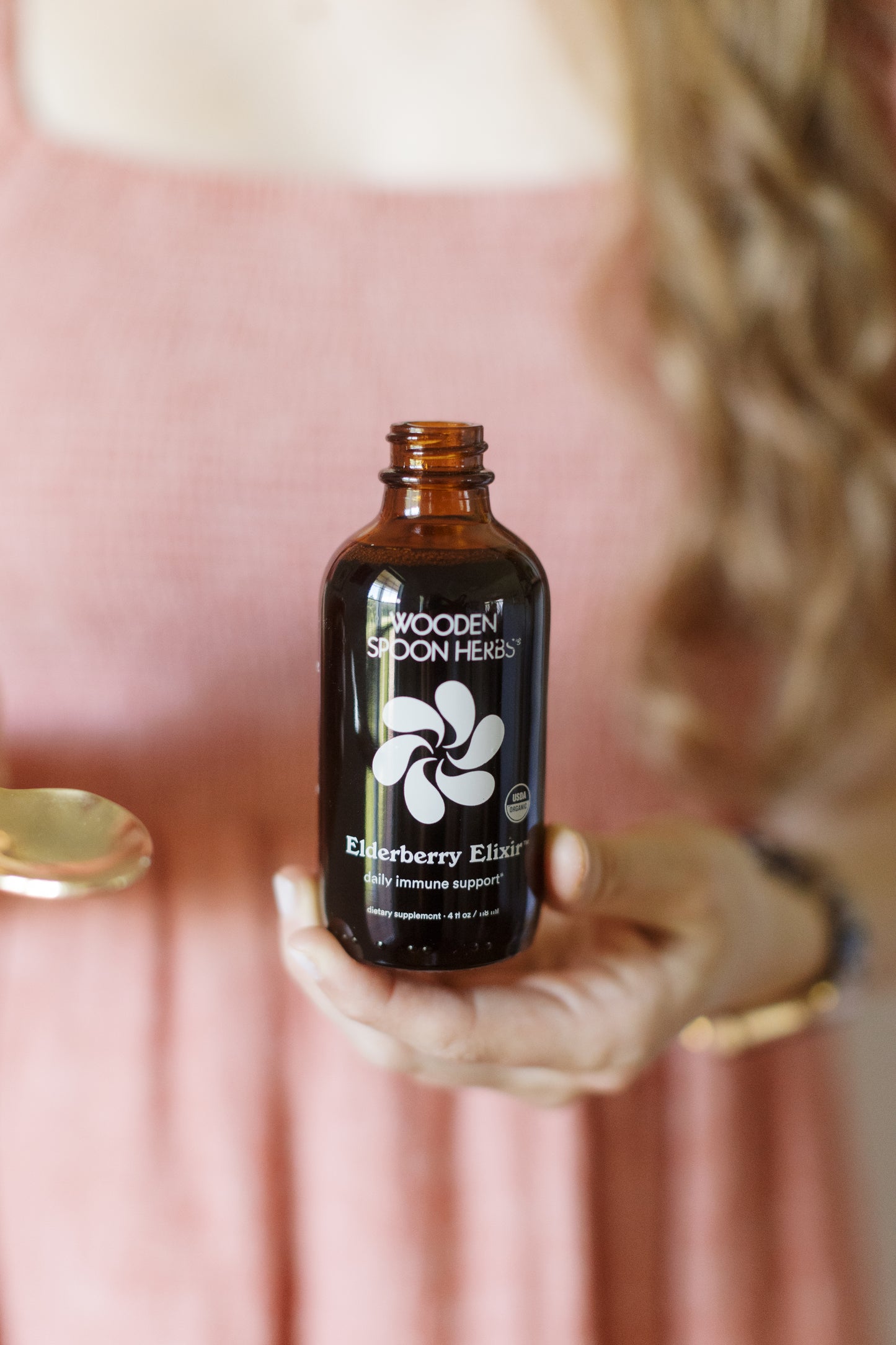 A bottle of Wooden Spoon Herbs' Elderberry Elixir