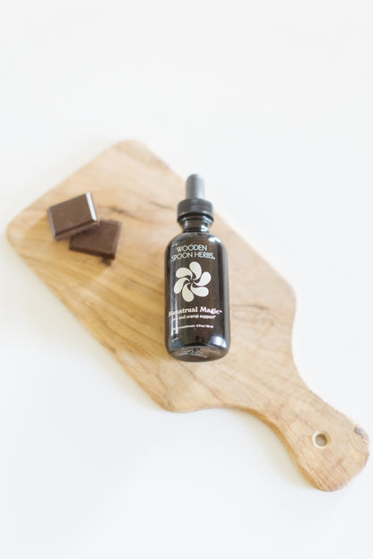 A bottle of Menstrual Magic by Wooden Spoon Herbs